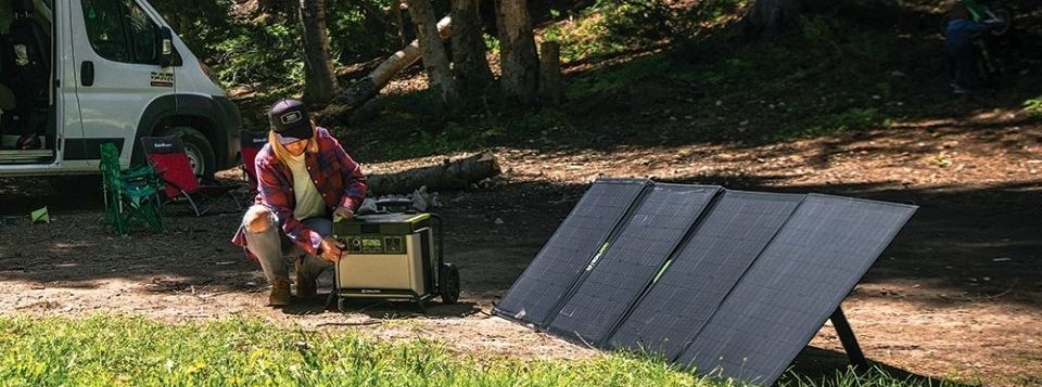 a woman installing her solar panel kit