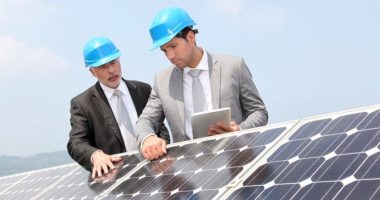 two engineers checking solar panels