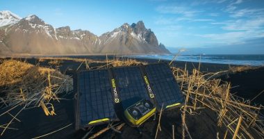 there is a solar portable charger near the sea