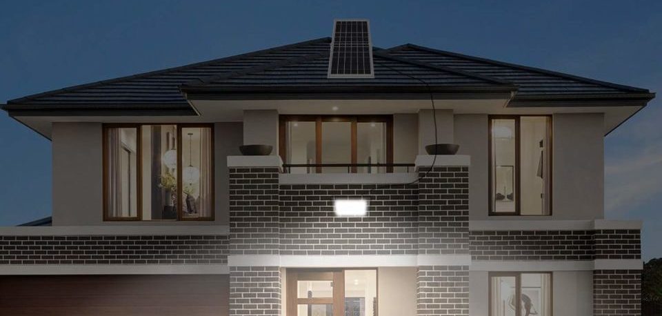 house with solar flood light